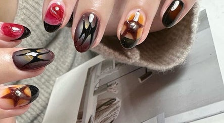 Chic nail art design at CutieNailStudio, Glendora, California, US. Creative nail art showcasing unique color blend.