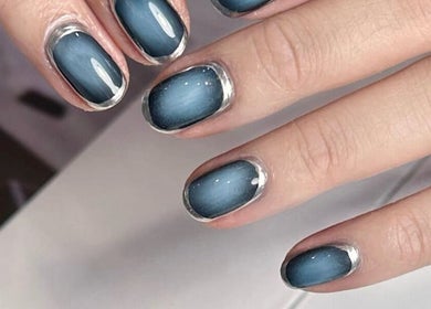 Chic blue ombre nails from CutieNailStudio in Glendora, California, US. Perfect blend of style and elegance.
