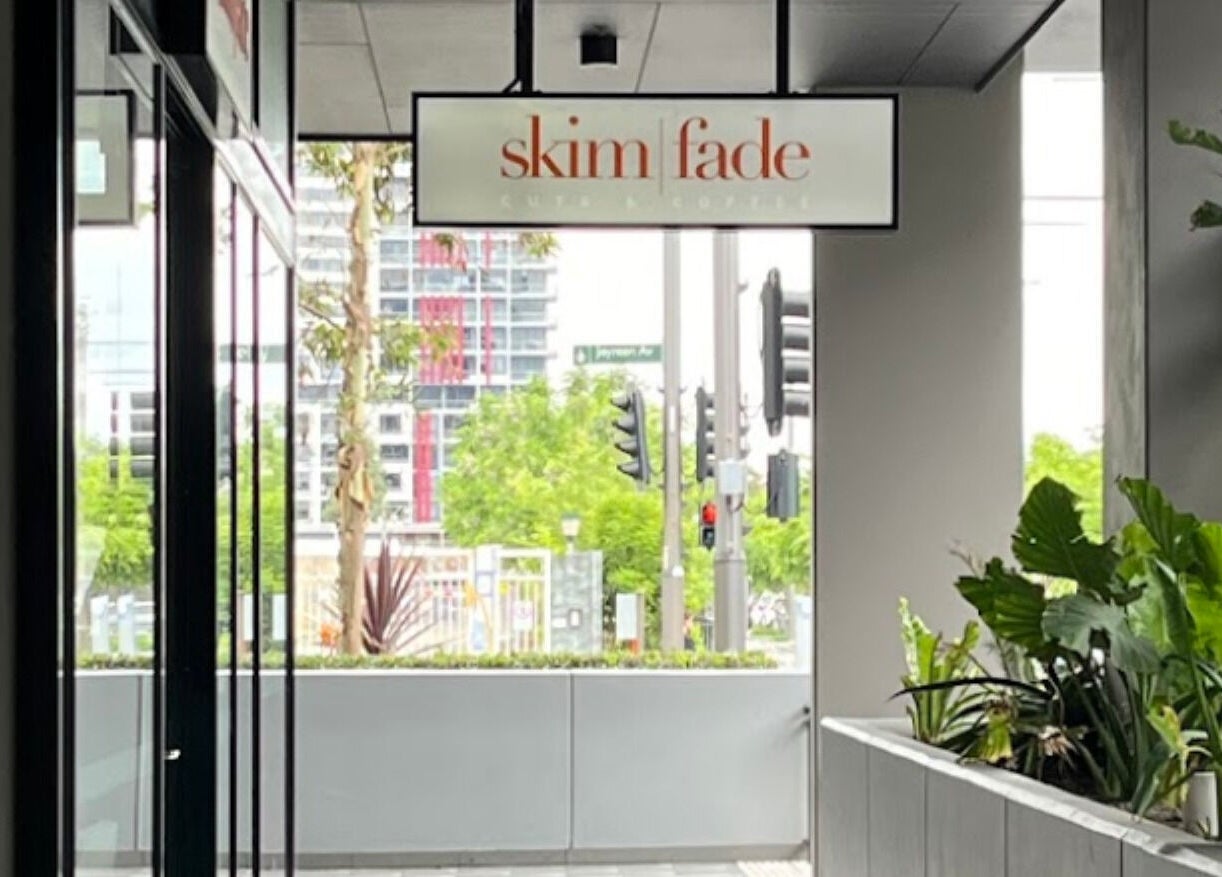 SkimFade salon exterior in Zetland, New South Wales, AU, showcasing urban style and greenery.