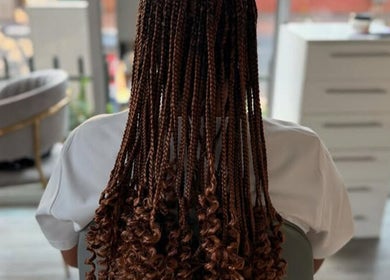 Intricate braided hairstyle at Zeecko Beauty Studio, Johannesburg, Gauteng, ZA.