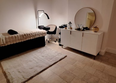 Relaxing spa room at The Beauty and Holistic Lounge Fakenham, Fakenham, England, GB with soft lighting and decor.