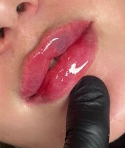 Close-up of glossy lips treatment at The Hideaway Daniella Marie Beauty & Aesthetics, Derby, England, GB.