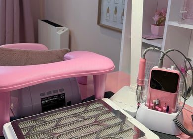 Manicure station at The Pink Beauty Room, Huddersfield, England, GB, featuring pink tools and decor.