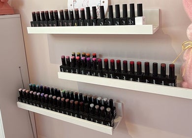 Nail polish selection at The Pink Beauty Room, Huddersfield, England, GB, showcasing vibrant colors.