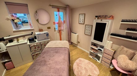 Cozy interior of The Pink Beauty Room, Huddersfield, England, GB, featuring a relaxing treatment space.