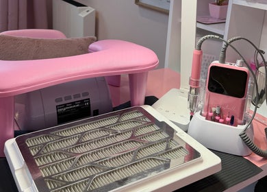 Nail station at The Pink Beauty Room, Huddersfield, England, GB featuring pink manicure equipment.