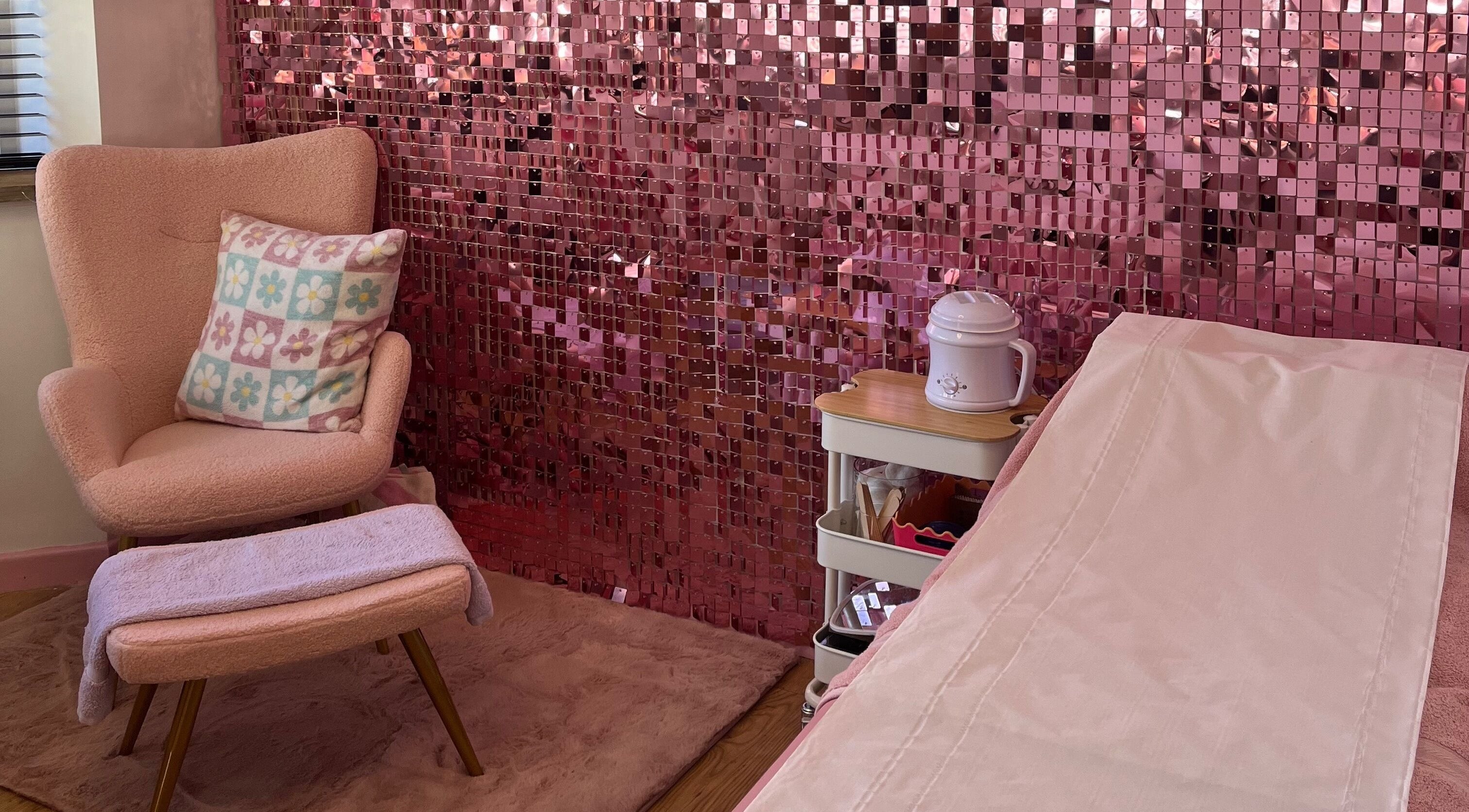 Relaxing pink chair and decor at Sugar Tips, Fareham, England, GB wellness venue.