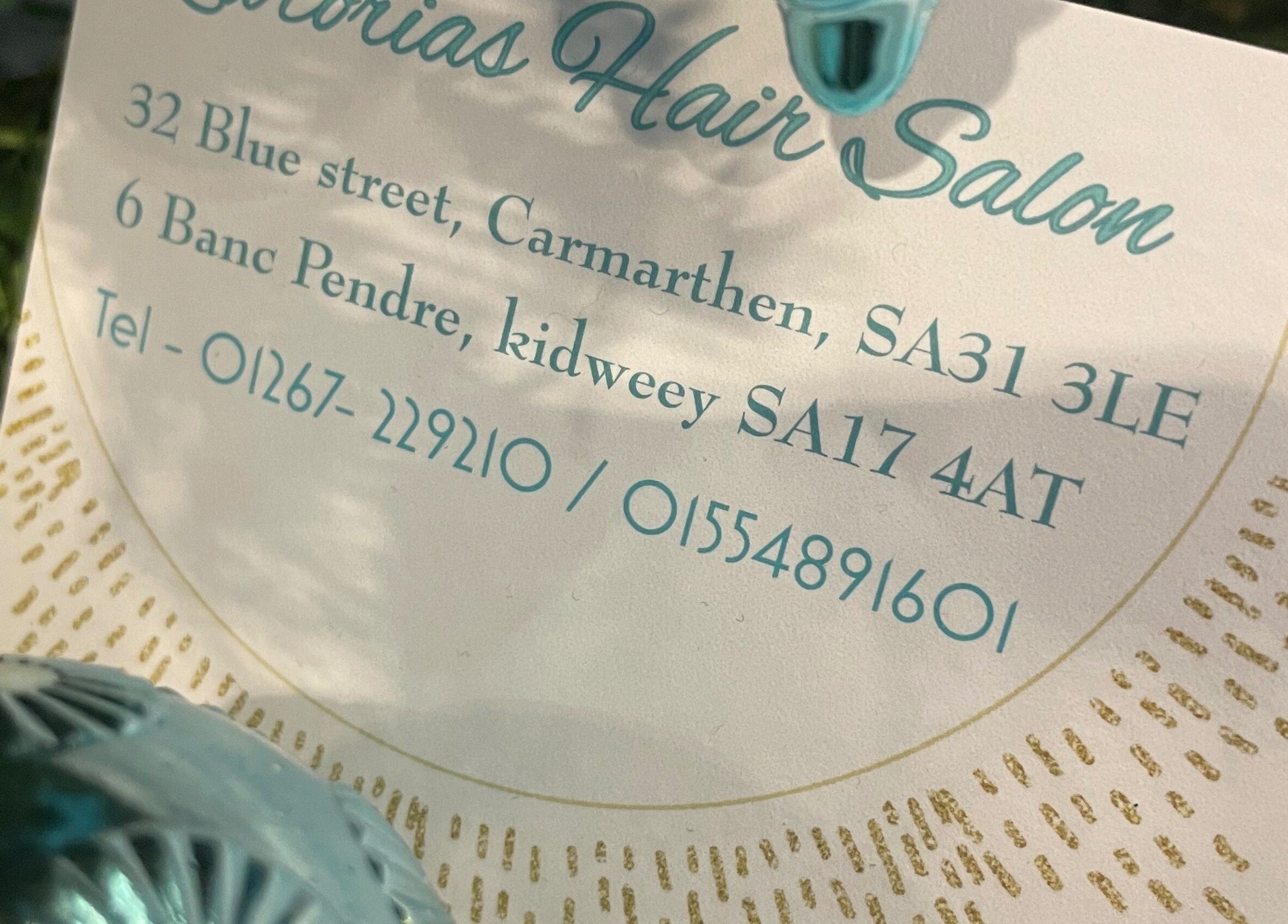 Elegant card for La’torias at Kidwelly, located in Kidwelly, Wales, GB, showcasing contact information and decor.