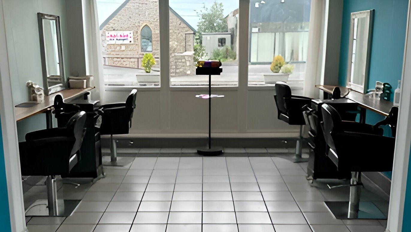 La’torias at Kidwelly salon interior with stylish chairs and mirrors in Kidwelly, Wales, GB.