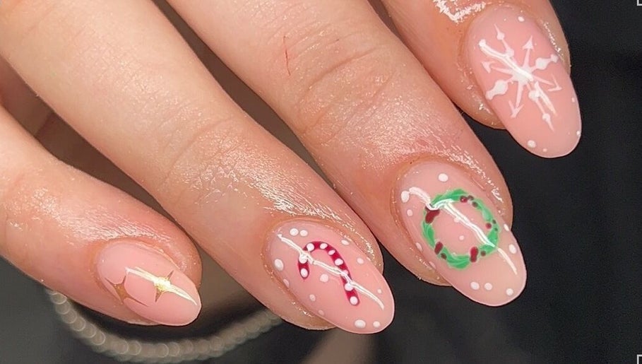 Festive nail art at Empire Beauty, Liverpool, England, GB featuring Christmas-themed designs.