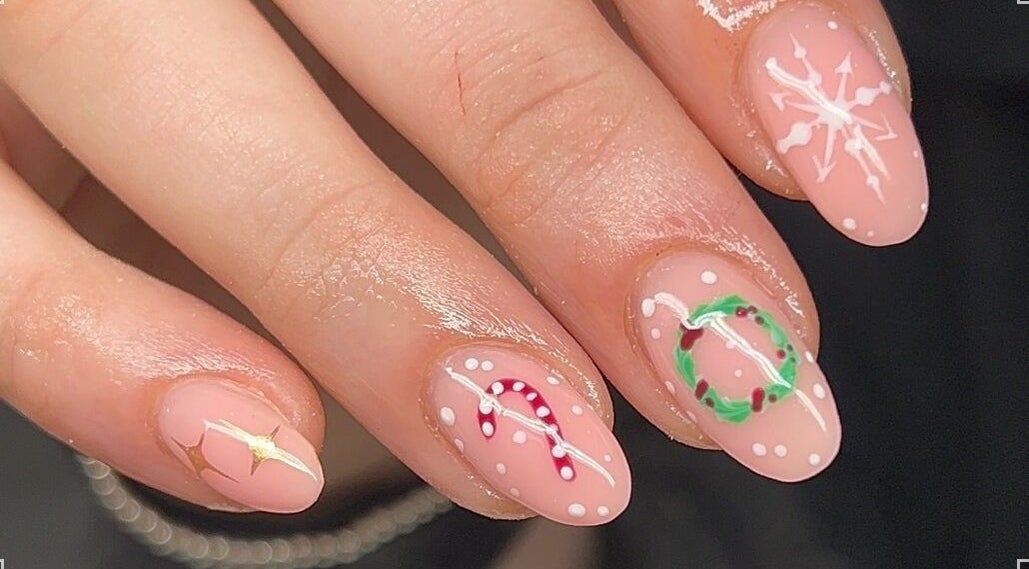 Beautiful festive nail art at Beauty By Olivia Megan in Liverpool, England, GB with intricate designs.