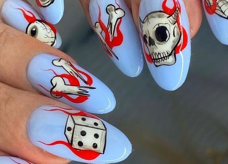 Edgy nail art design at Miss Betty Rose, Forest Lodge, New South Wales, AU with skull and dice motifs.