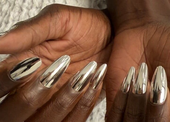Shiny chrome nails at Miss Betty Rose, Forest Lodge, New South Wales, AU showcasing nail artistry.
