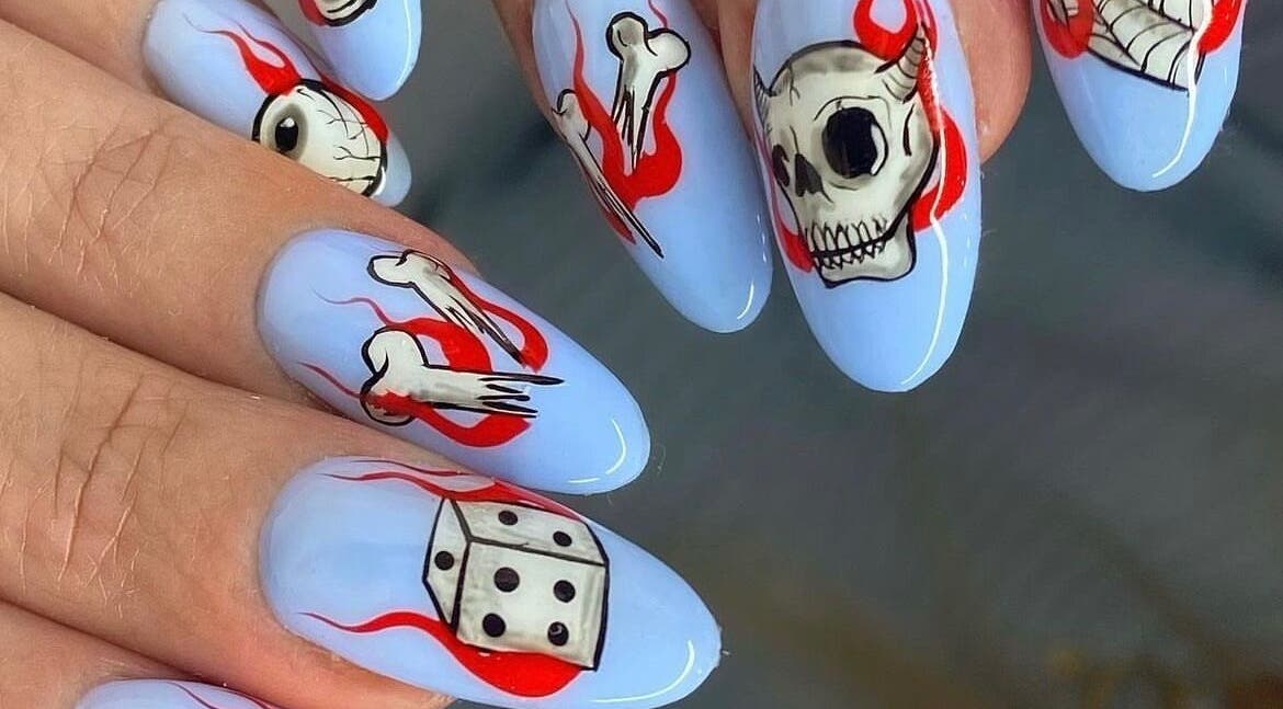 Spooky nail art at Miss Betty Rose, Forest Lodge, New South Wales, AU featuring skull and bones designs.