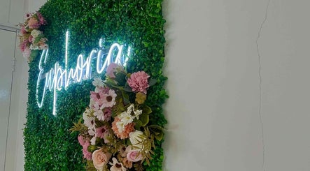 Floral wall decor at Hair & Makeup by Galyna Shchyrba, Plymouth, England, GB.