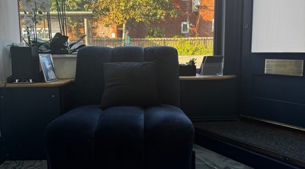 Plush chair in reception of Annayah Aesthetics (Kemptown), Brighton And Hove, England, GB.