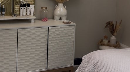Serene spa room at Enhancedbeauty in Inverness, Scotland, GB featuring elegant decor and wellness products.