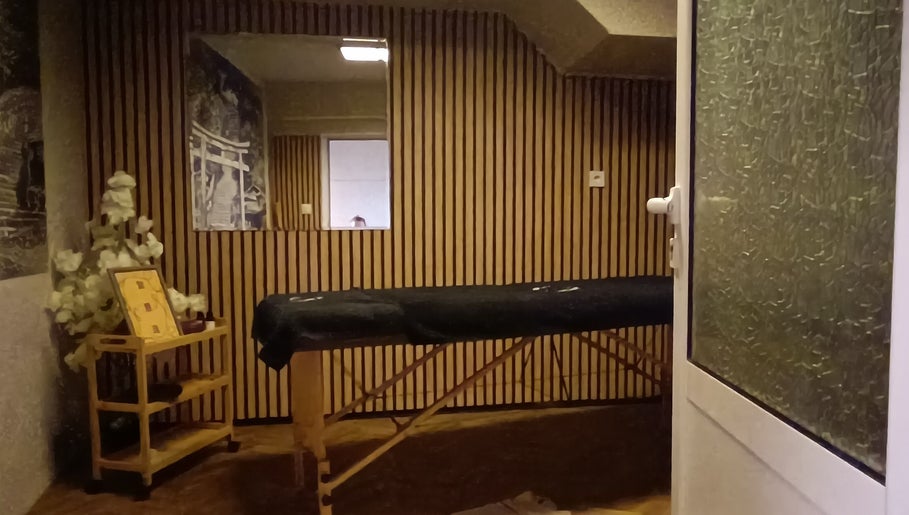 Serene massage room at Sakura Salon and Wellness, Plovdiv, Plovdiv, BG, offering relaxation and peace.