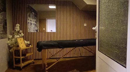 Serene massage room at Sakura Salon and Wellness, Plovdiv, Plovdiv, BG, offering relaxation and peace.