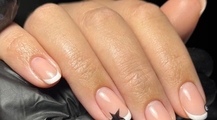 French manicure with a star design at Beauty Nook by Madie, Brabham, Western Australia, AU.