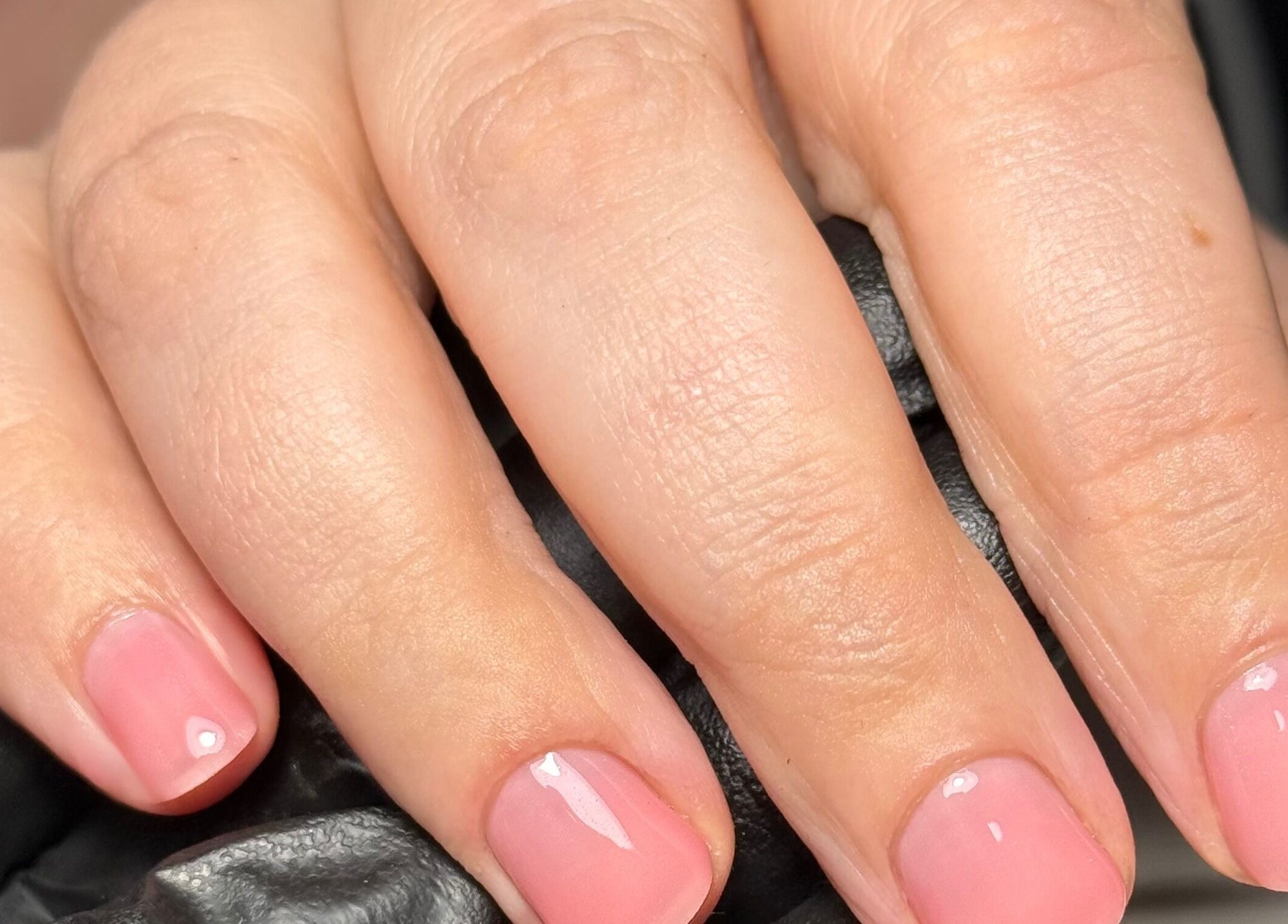 Close-up of elegant pink manicure from Beauty Nook by Madie, Brabham, Western Australia, AU.