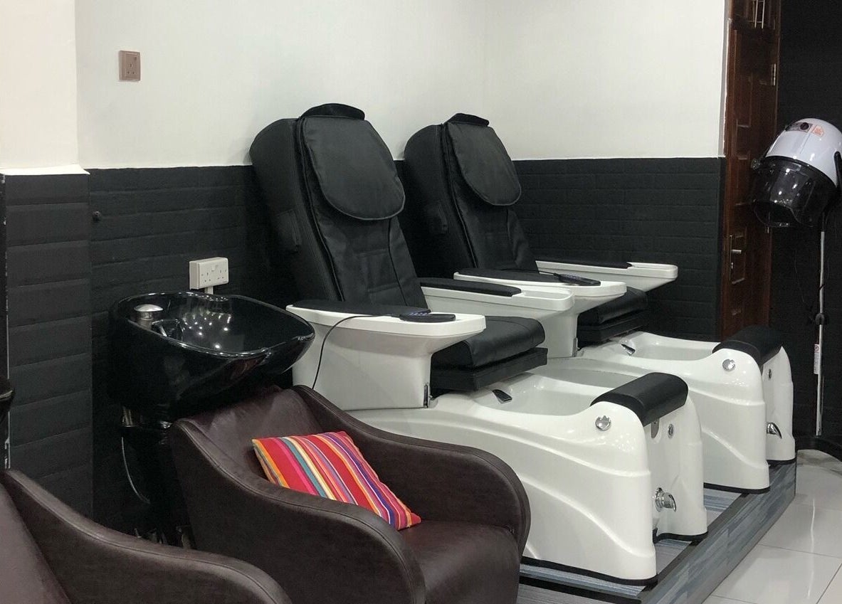Luxurious pedicure chairs at Artistic Grooming Parlour, Nairobi, Nairobi County, KE with modern design.