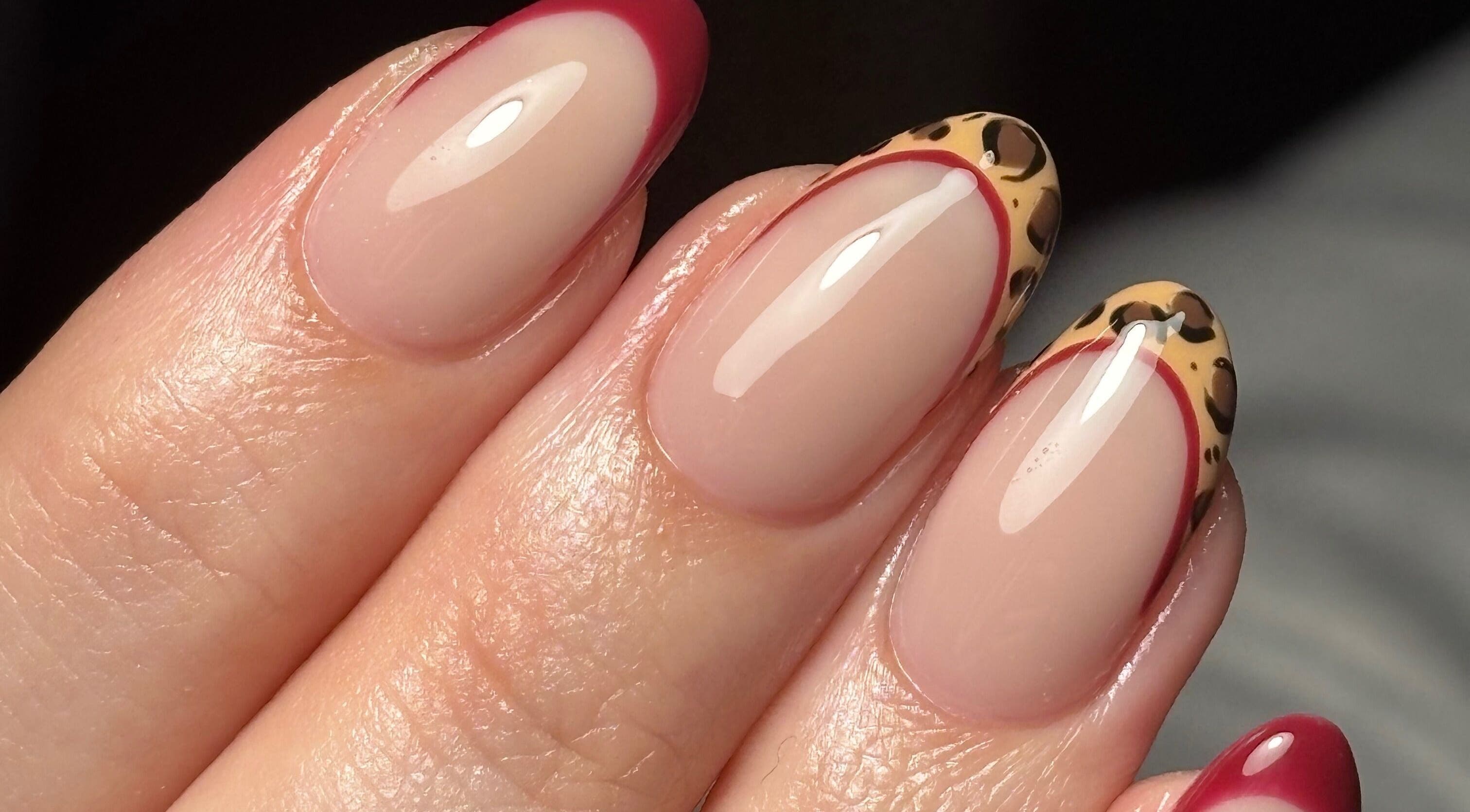 Stylish nail art with leopard print tips at Rogue Beauty, Hartlepool, England, GB.