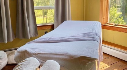 Cozy massage room at French Touch Custom Massage Midtown Manhattan and Brooklyn Heights, New York, New York, US.