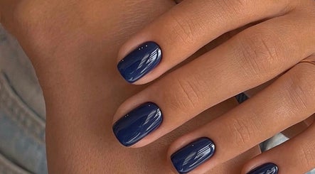 Close-up of elegant indigo nails beautifully manicured at N.SPA Mobile Beauty in London, England, GB.