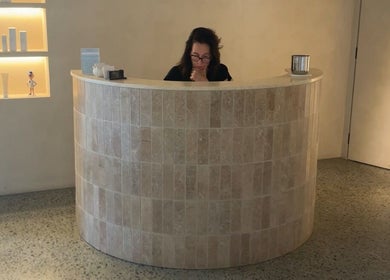 Reception area at Schofield Beauty Co, Freshwater, New South Wales, AU with products on display.