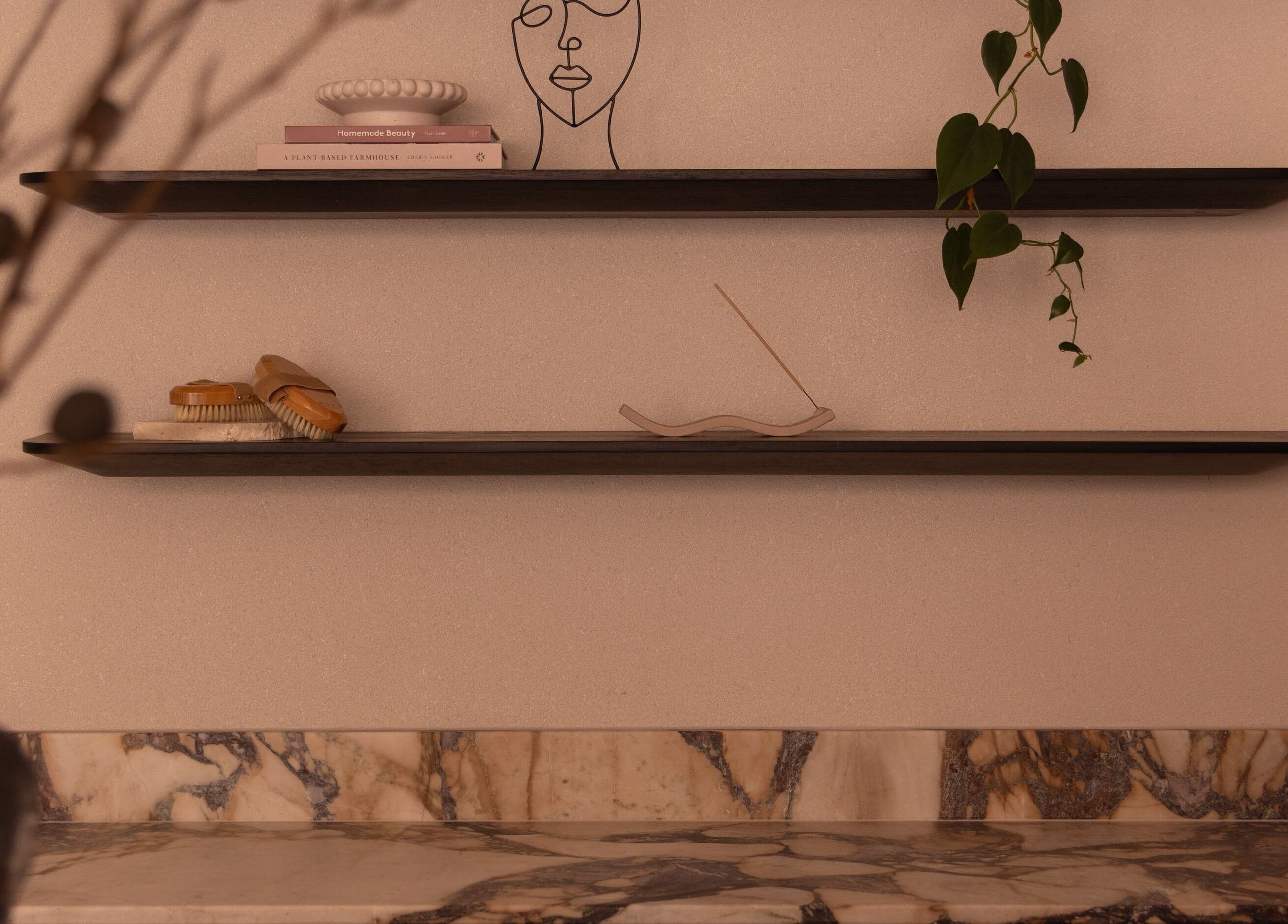 Elegant shelving with decor at Kuyu Colonics, Turner, Australian Capital Territory, AU.