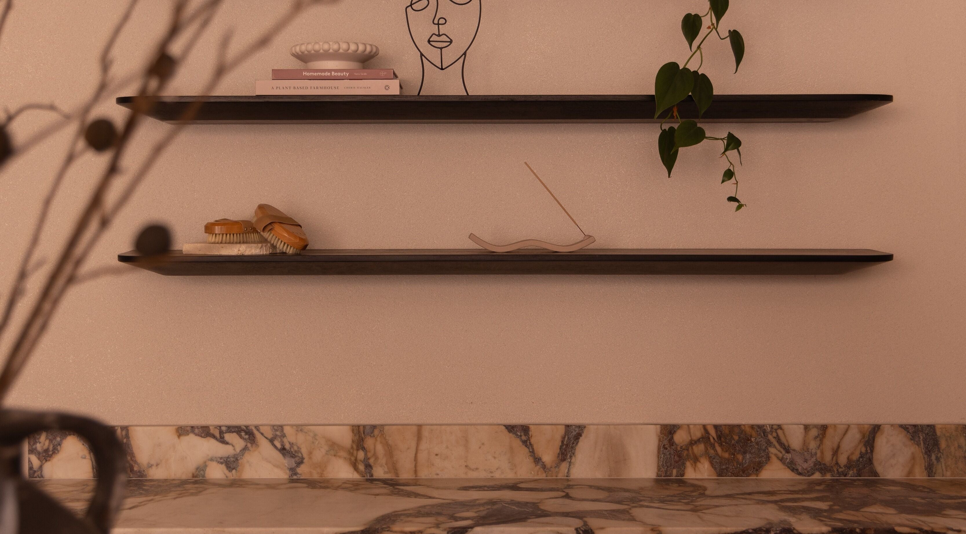 Elegant shelving with decor at Kuyu Colonics, Turner, Australian Capital Territory, AU.