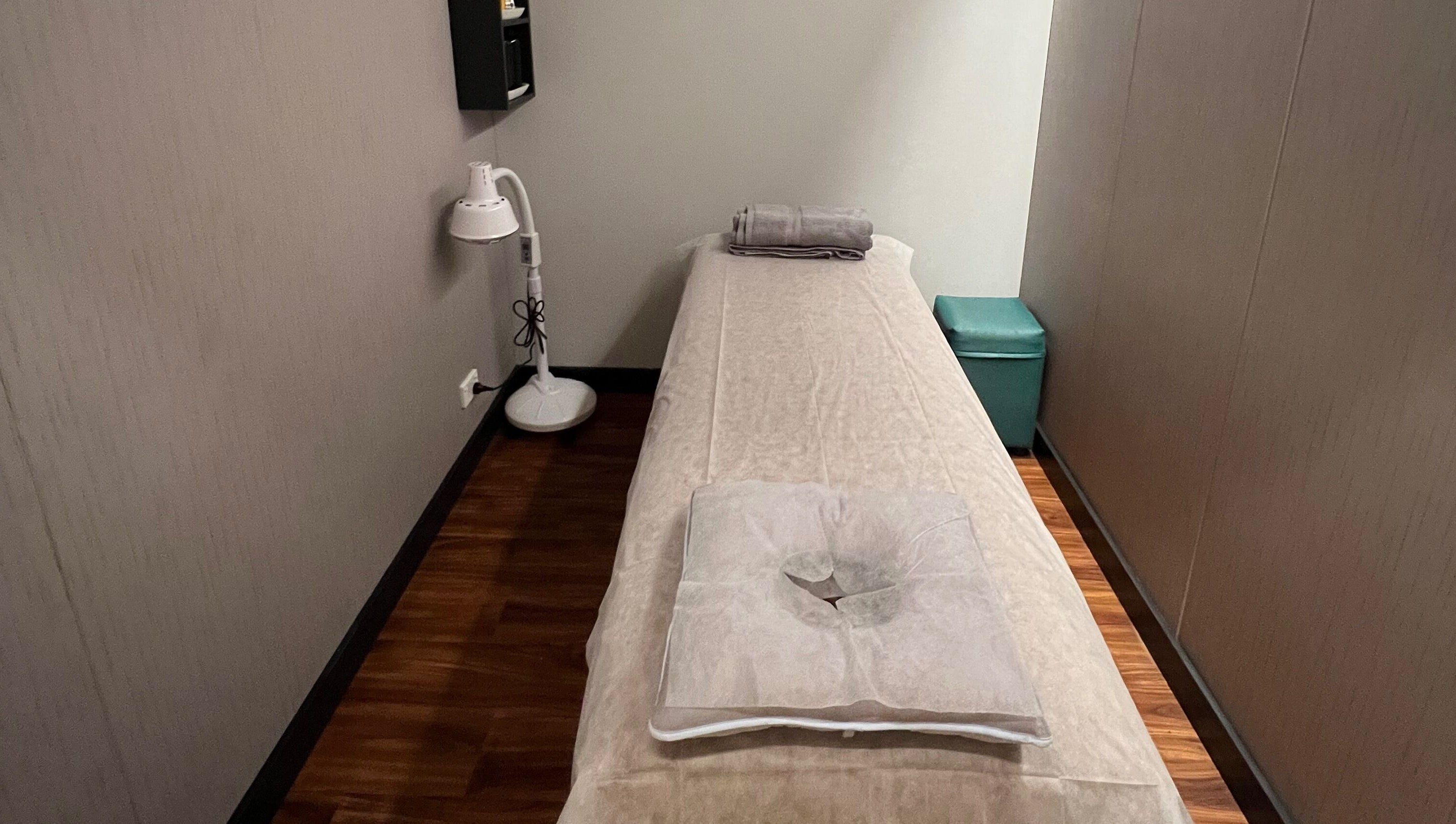 Quiet massage room at Max Massage and Acupuncture in Cardiff, New South Wales, AU with a cozy treatment bed.