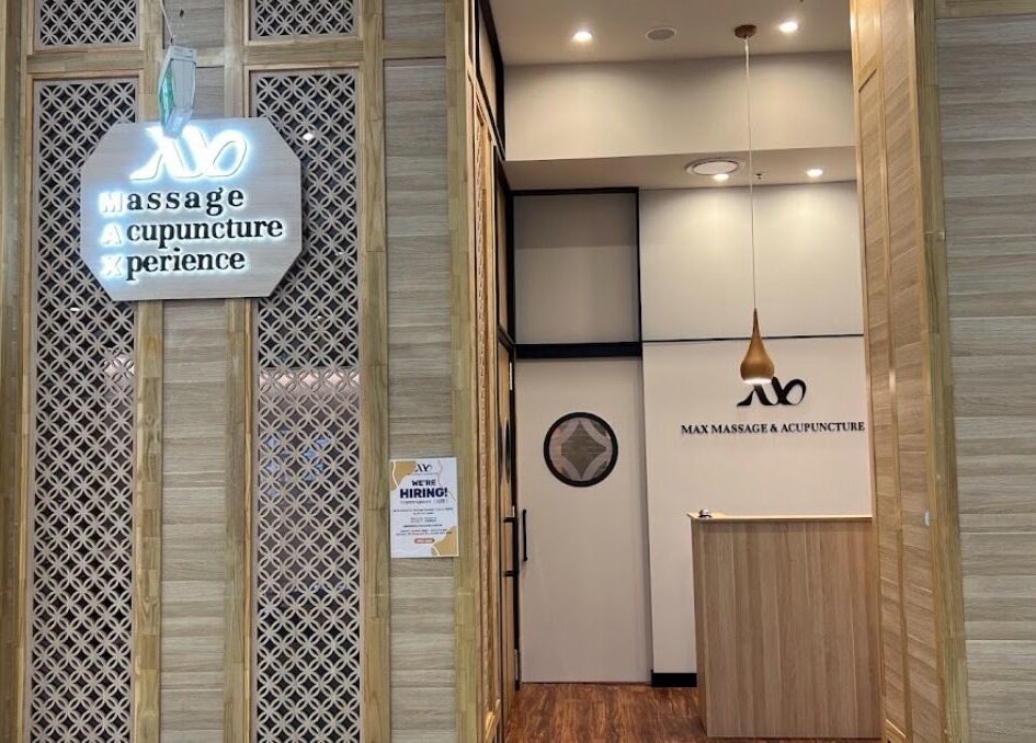 Entrance of Max Massage and Acupuncture in Cardiff, New South Wales, AU, showcasing modern design and signage.