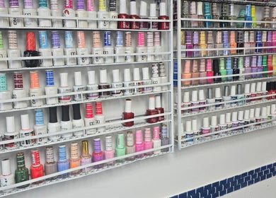 Diverse nail polish collection at Sherifa Nails, George Town, KY showcasing vibrant color options.