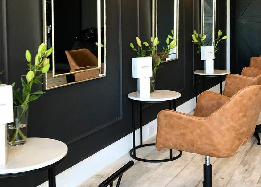 Beautiful by Clariece salon in Holden Hill, South Australia, with chic chairs and stylish mirrors.