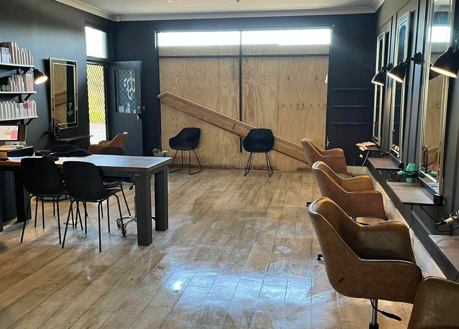 Stylish interior of Beautiful by Clariece in Holden Hill, South Australia, with modern seating and sleek decor.