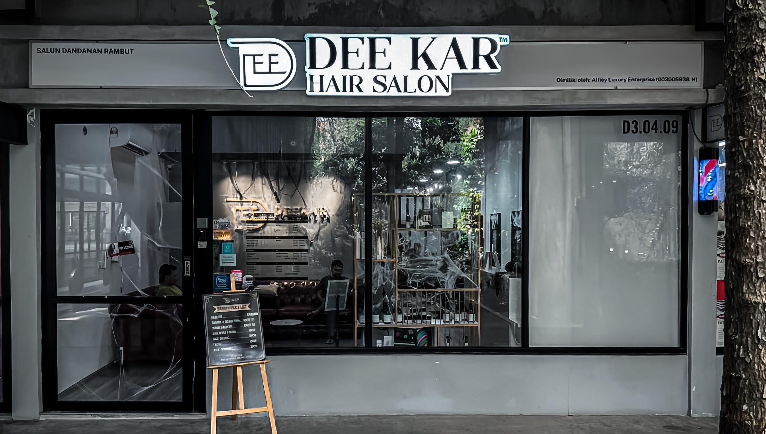 Modern facade of Dee Kar Hair Salon, Cyberjaya, Selangor, MY showcasing elegant salon aesthetics.