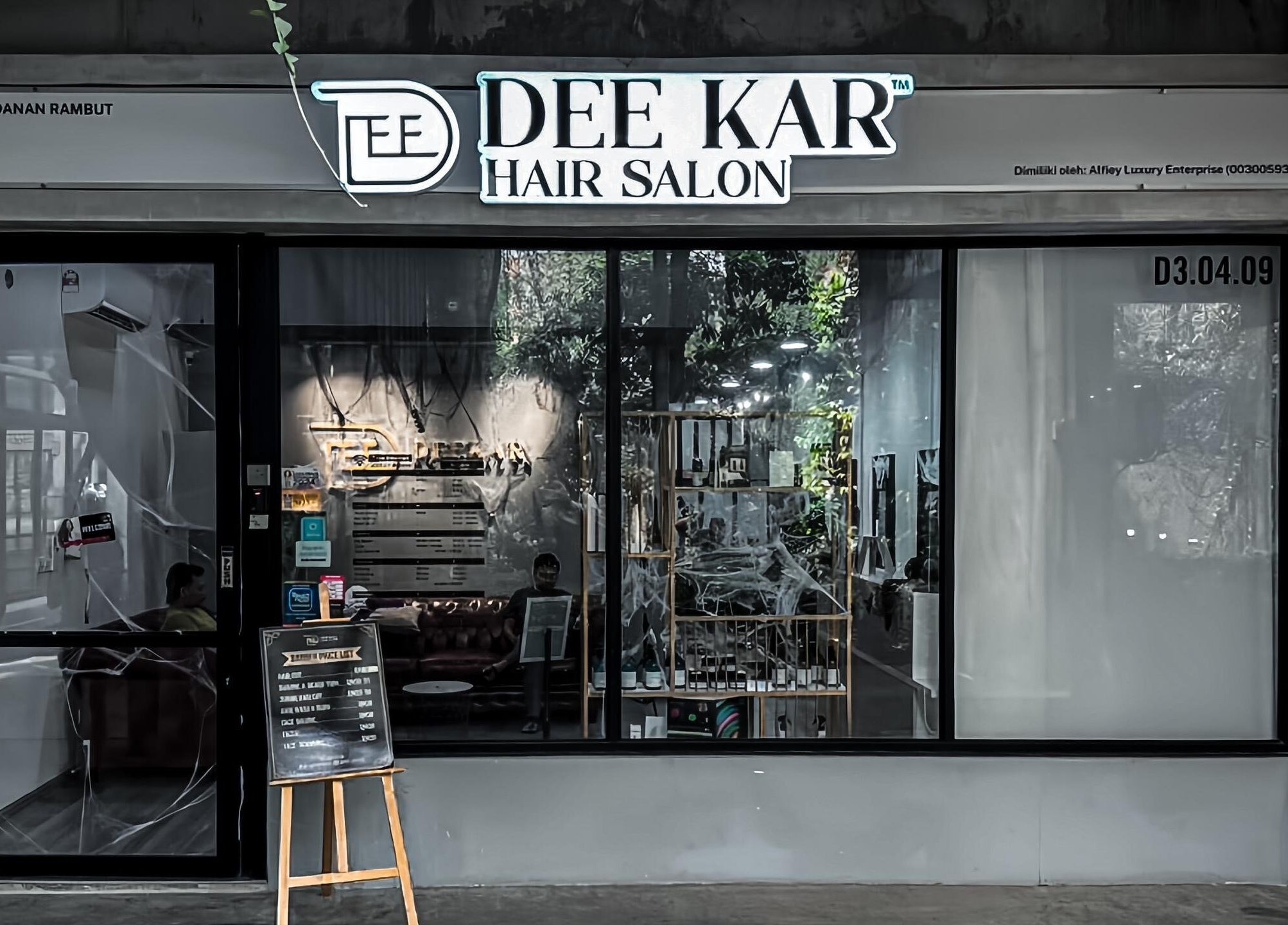 Modern facade of Dee Kar Hair Salon, Cyberjaya, Selangor, MY showcasing elegant salon aesthetics.