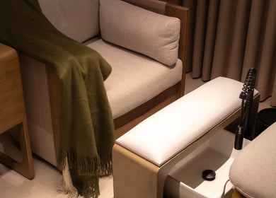 Relaxing pedicure chair setup at Senses Spa (Home service), Riyadh, Riyadh Province, SA with green throw.