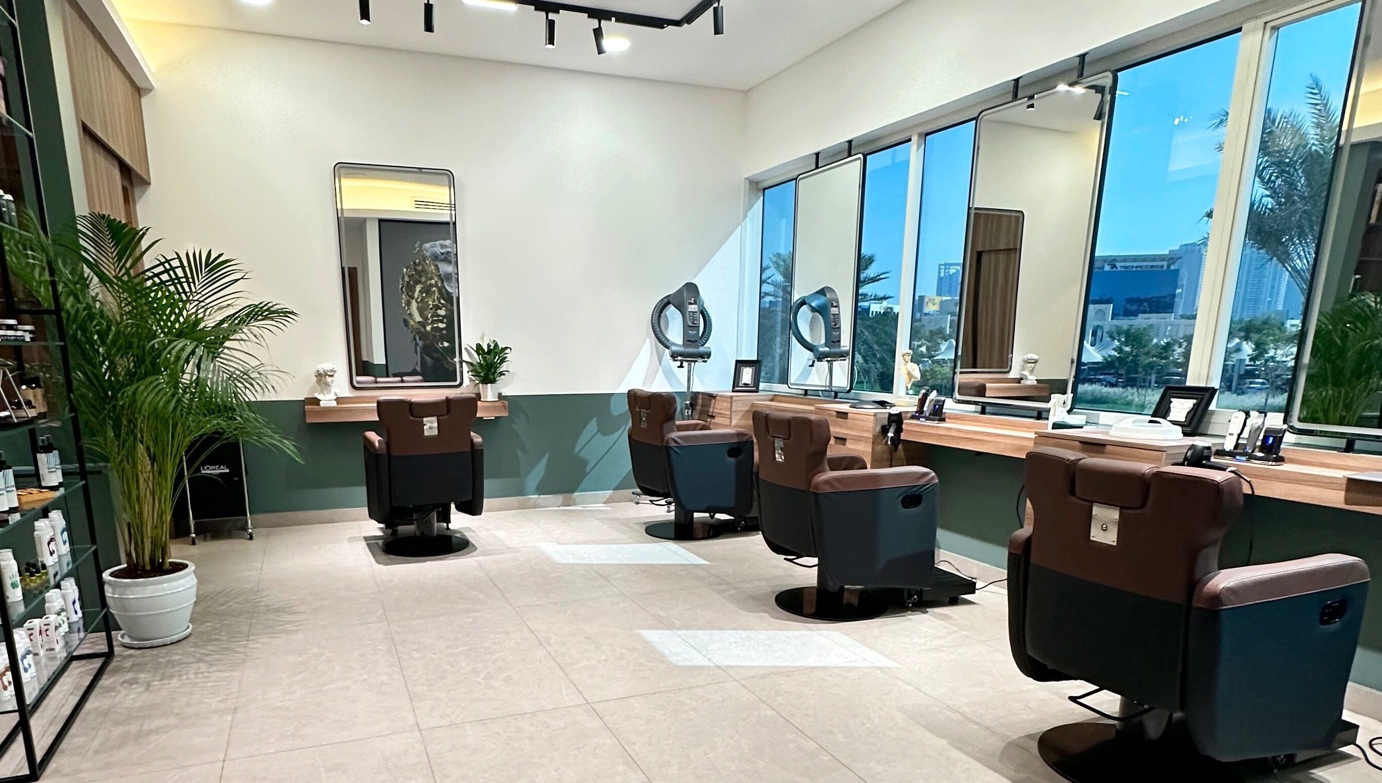 Spacious interior of The Barber Code Gents Salon in Dubai, Dubai, AE, featuring modern salon chairs and mirrors.