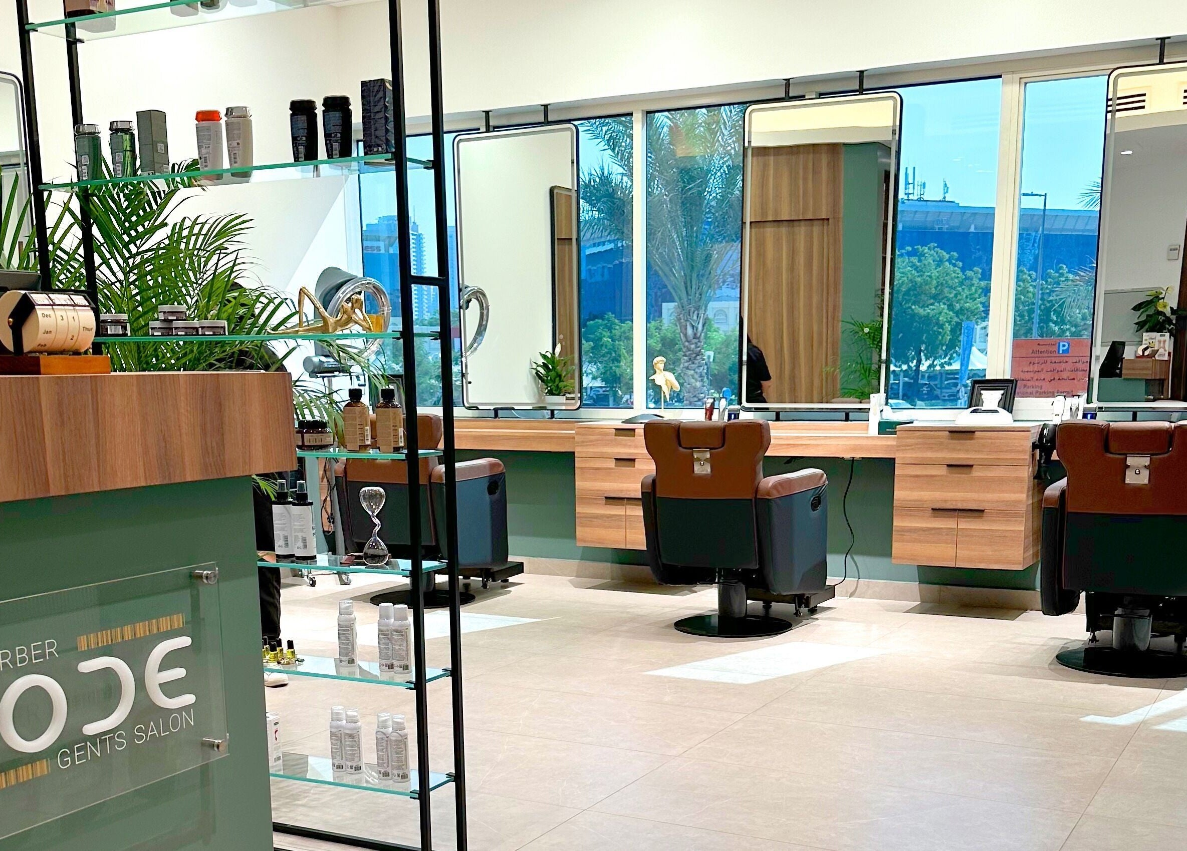 Sleek interior of The Barber Code Gents Salon in Dubai, Dubai, AE, featuring modern barber chairs and mirrors.