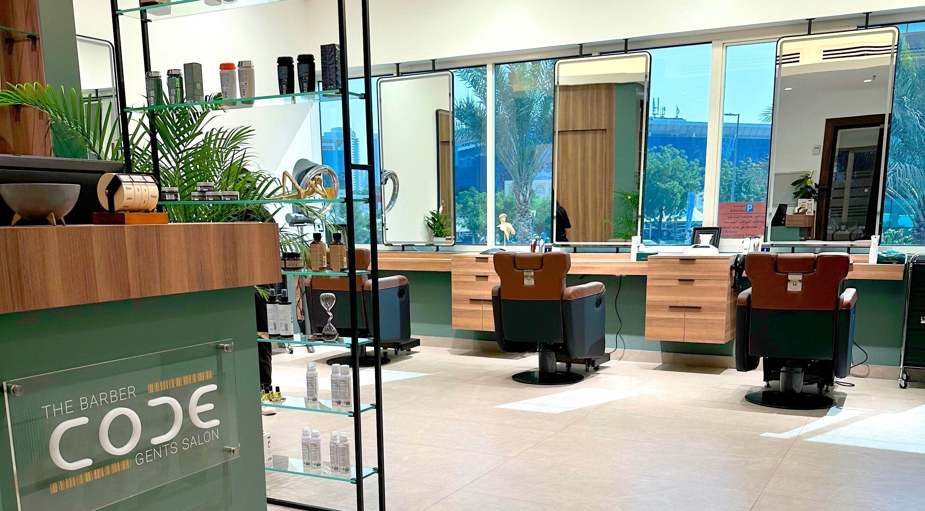 Sleek interior of The Barber Code Gents Salon in Dubai, Dubai, AE, featuring modern barber chairs and mirrors.