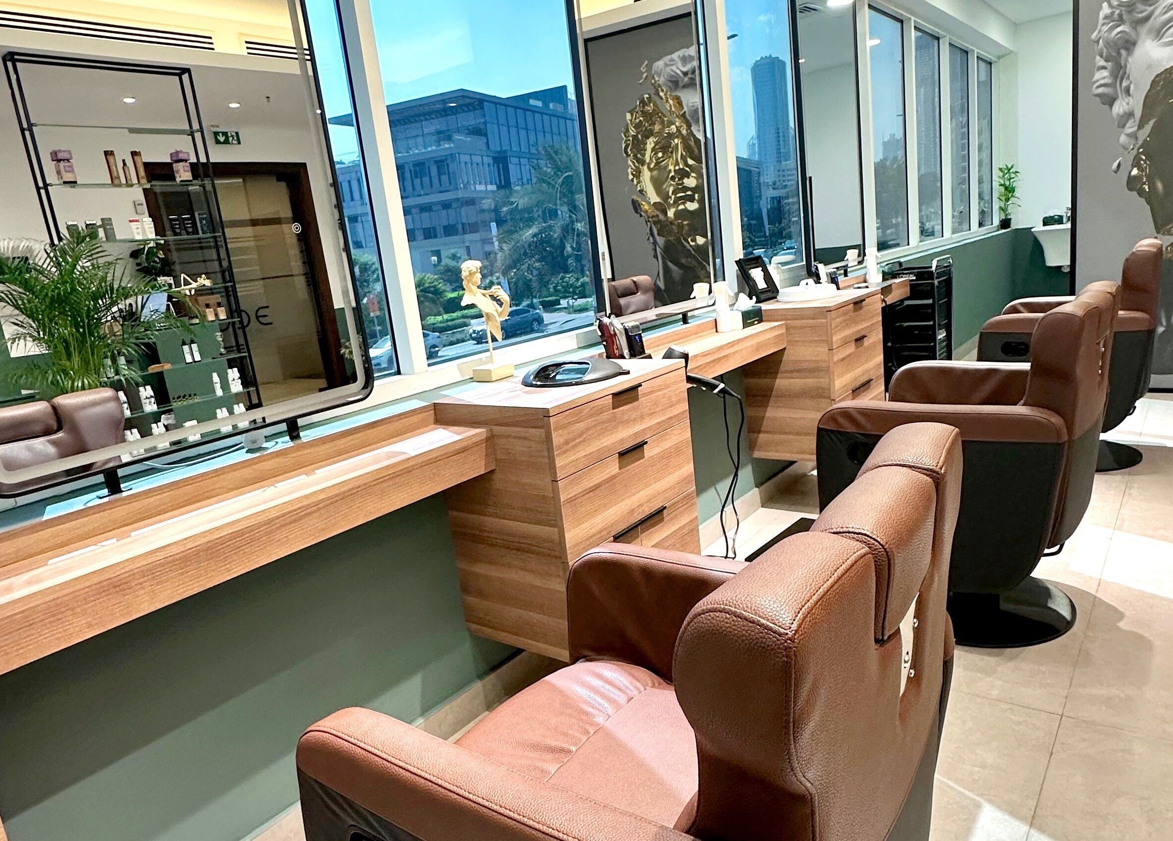 Elegant interior of The Barber Code Gents Salon, Dubai, Dubai, AE with stylish chairs and decor.