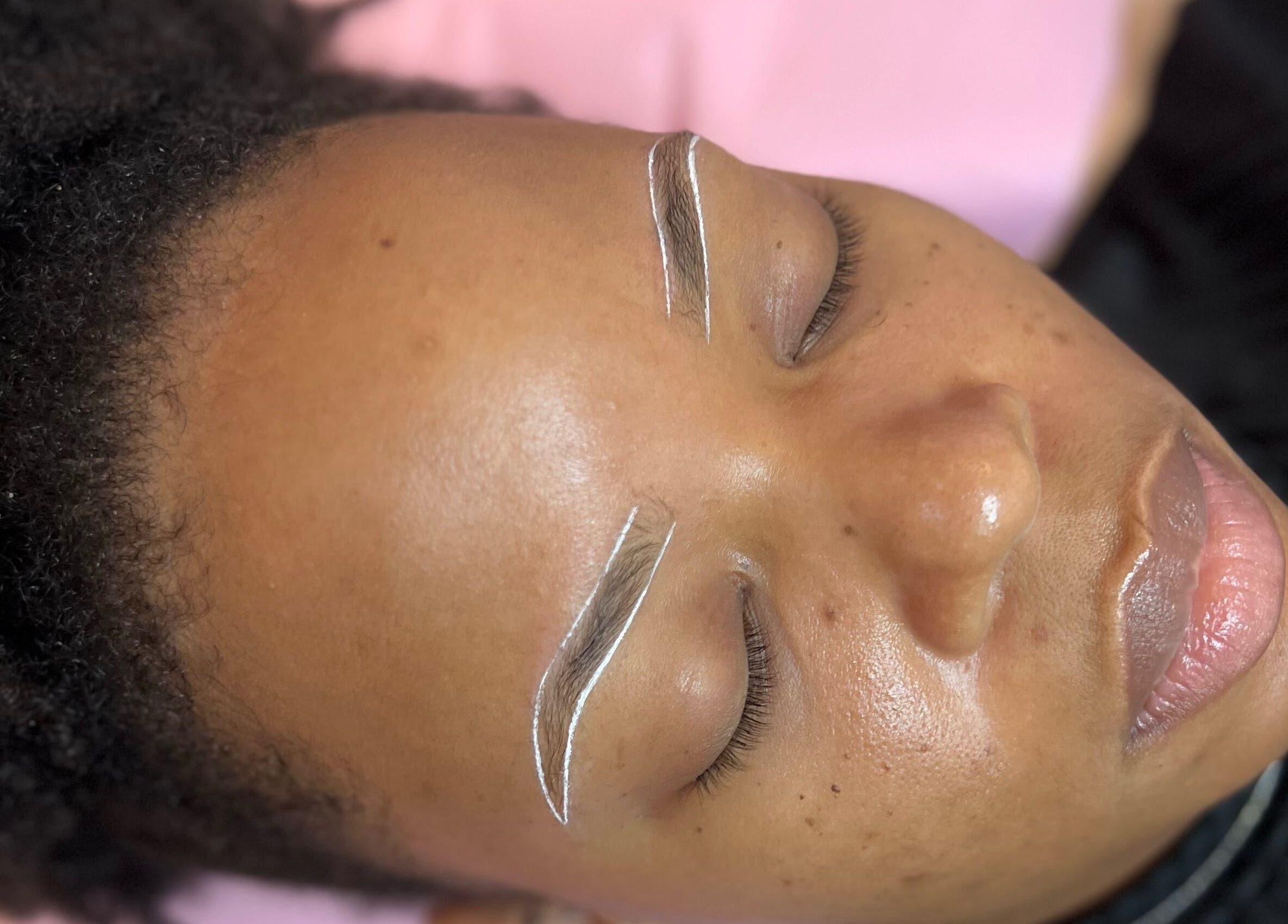 A client at The Brow Studio in Holetown, Saint James, BB receiving precision eyebrow shaping.