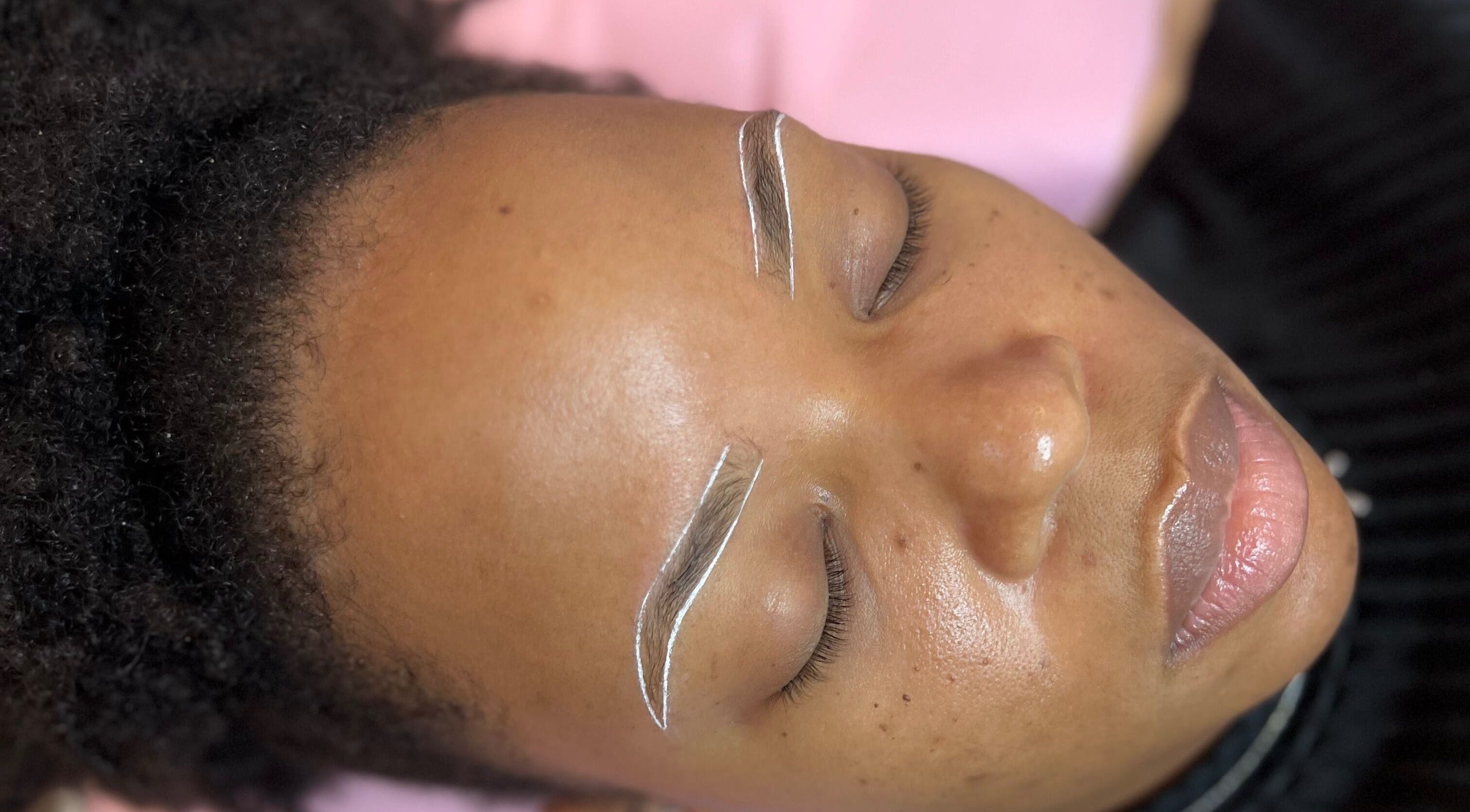 A client at The Brow Studio in Holetown, Saint James, BB receiving precision eyebrow shaping.