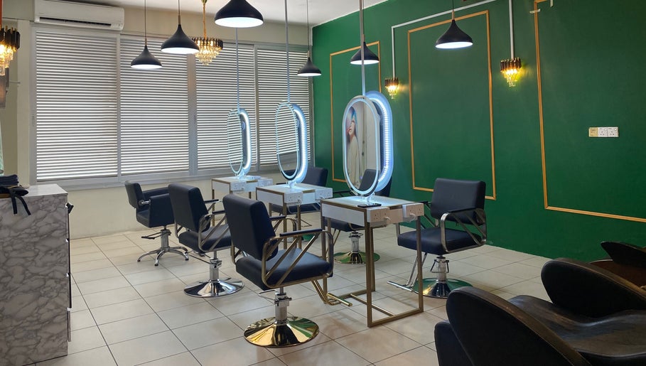 Modern salon chairs and mirrors at Efyza Salon, Sungai Petani, Kedah, MY with stylish lighting and decor.