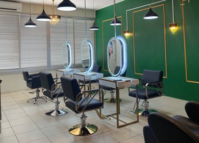 Modern salon chairs and mirrors at Efyza Salon, Sungai Petani, Kedah, MY with stylish lighting and decor.