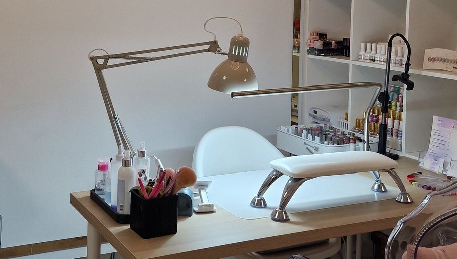 Nail treatment station at Gels By Kana in Walsall, England, GB showcasing tools and products.