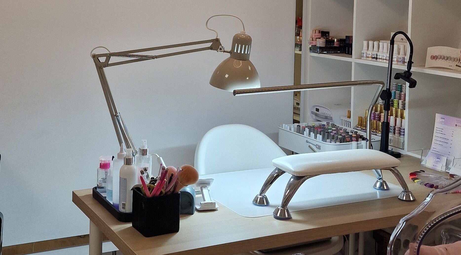 Nail treatment station at Gels By Kana in Walsall, England, GB showcasing tools and products.